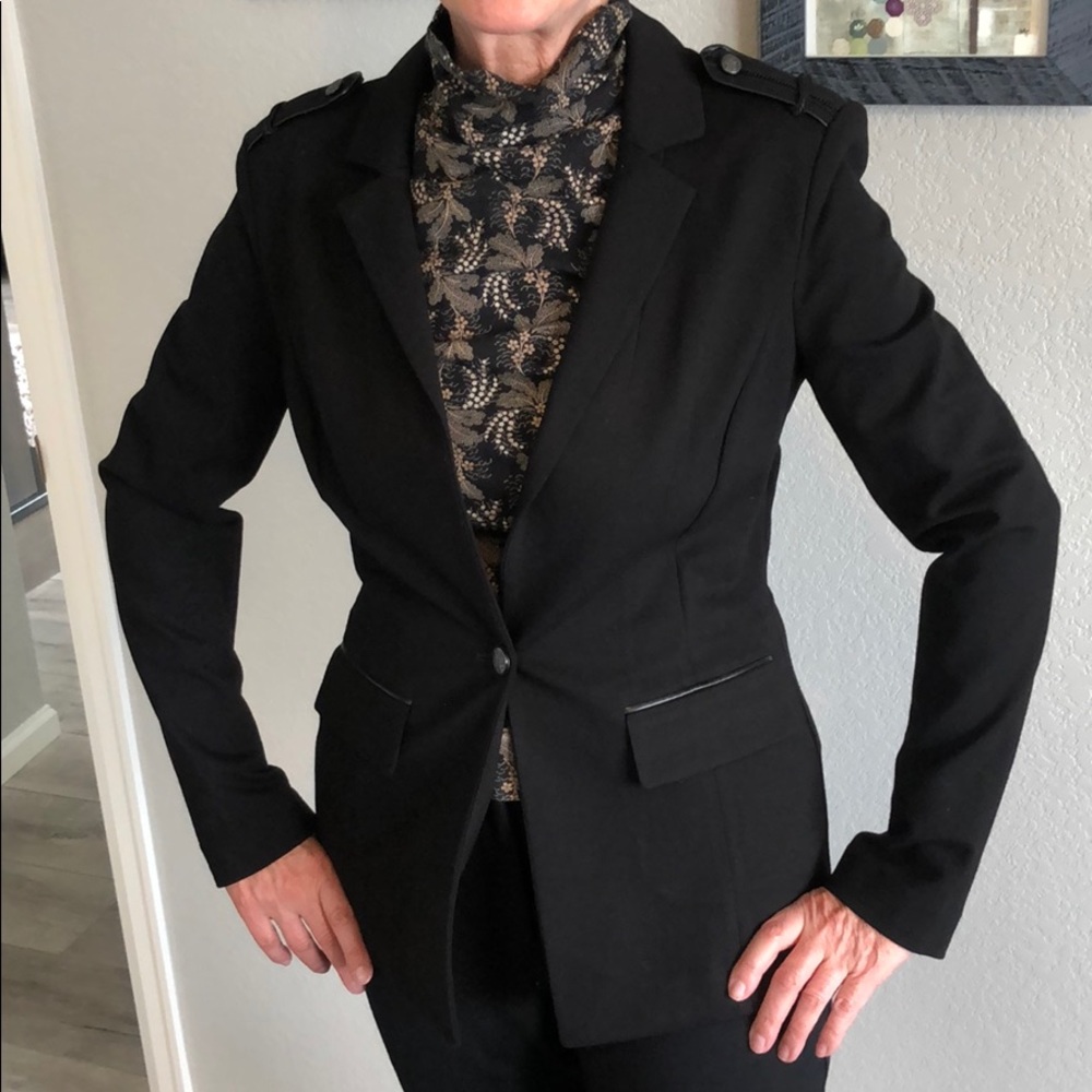Black blazer with pleather detail. WHBM